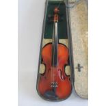 A CHINESE MADE VIOLIN in an antique wooden carry case