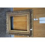 A 19TH CENTURY GILTWOOD PICTURE FRAME, moulded foliate detail throughout, rebate 60 x 46 cm