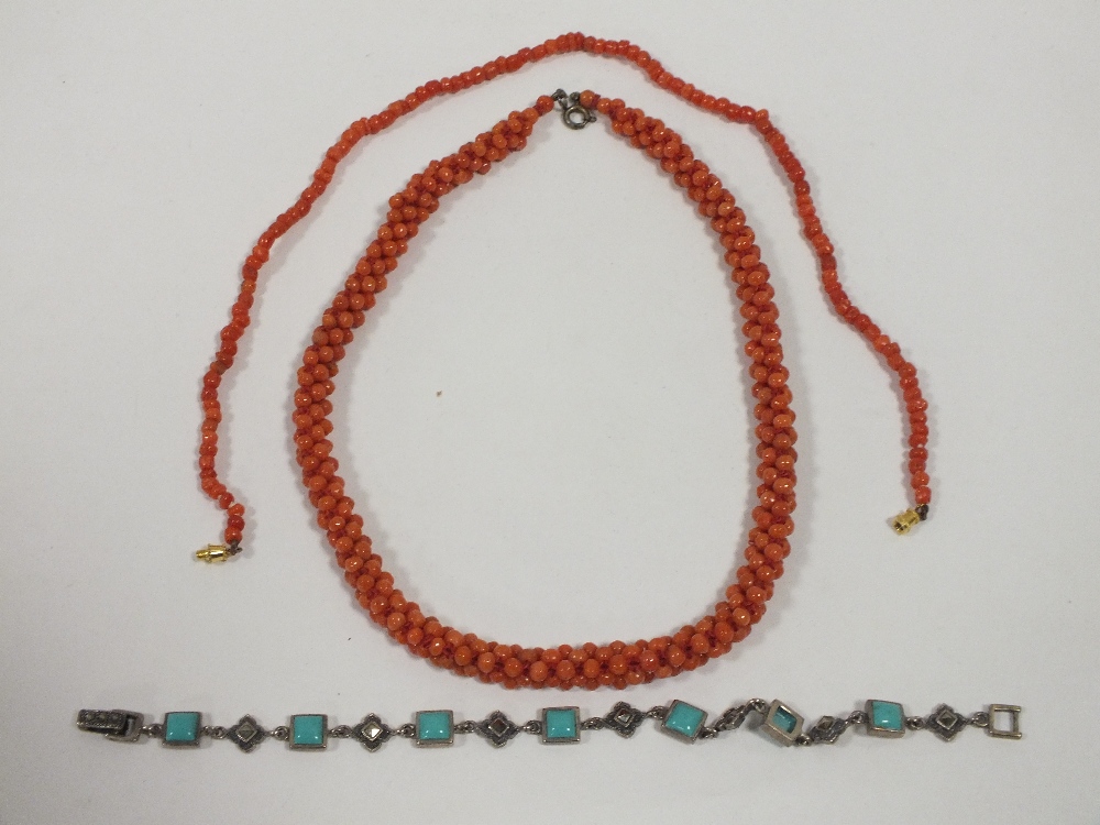 A CORAL BEAD NECKLACE TOGETHER WITH A SILVER AND TURQUOISE BRACELET