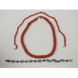 A CORAL BEAD NECKLACE TOGETHER WITH A SILVER AND TURQUOISE BRACELET