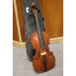 A GOOD ANTIQUE VIOLIN WITH TWO PIECE BACK, bears label for 'Carlo Storioni', length of back 35.5
