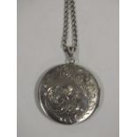 A LARGE SILVER LOCKET ON CHAIN