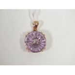 A HALLMARKED 9K ROSE GOLD PINK AMETHYST AND DIAMOND PENDANT, the amethyst is 6.92 carats measuring