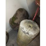 A LARGE STONE MUSHROOM TOP ON ROLLER BASE