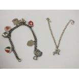 A SILVER AND ENAMEL CHARM BRACELET