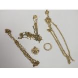 A BAG OF 9CT GOLD AND YELLOW METAL JEWELLERY TO INCLUDE A HEART SHAPED LOCKET, CHAINS ETC.