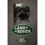 ***A MODERN CAST LAND ROVER BELL AND TWO PLAQUES