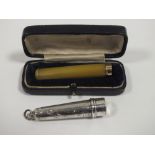 A CASED CHEROOT HOLDER WITH YELLOW METAL BAND STAMPED 18 TOGETHER WITH A HALLMARKED SILVER CHEROOT