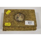 A VICTORIAN GILT METAL BOX WITH INSET PORTRAIT MINIATURE