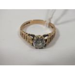 A LADIES 9CT GOLD SOLITAIRE RING