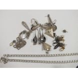 A BAG OF SILVER AND WHITE METAL JEWELLERY