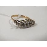 A LADIES 9CT GOLD CLUSTER RING SET WITH 14 CLEAR STONES