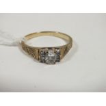 A LADIES 9CT GOLD DRESS RING SET WITH FIVE CLEAR STONES