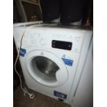 AN INDESIT WASHING MACHINE