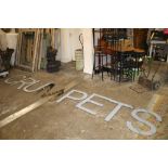 A QUANTITY OF LARGE MIRRORED WALL HANGING LETTERS : C.R.U.M.P.E.T.S