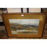 A FRAMED AND GLAZED WATERCOLOUR DEPICTING A COUNTRY RIVER SCENE WITH CATTLE AND BIRDS SIGNED W.