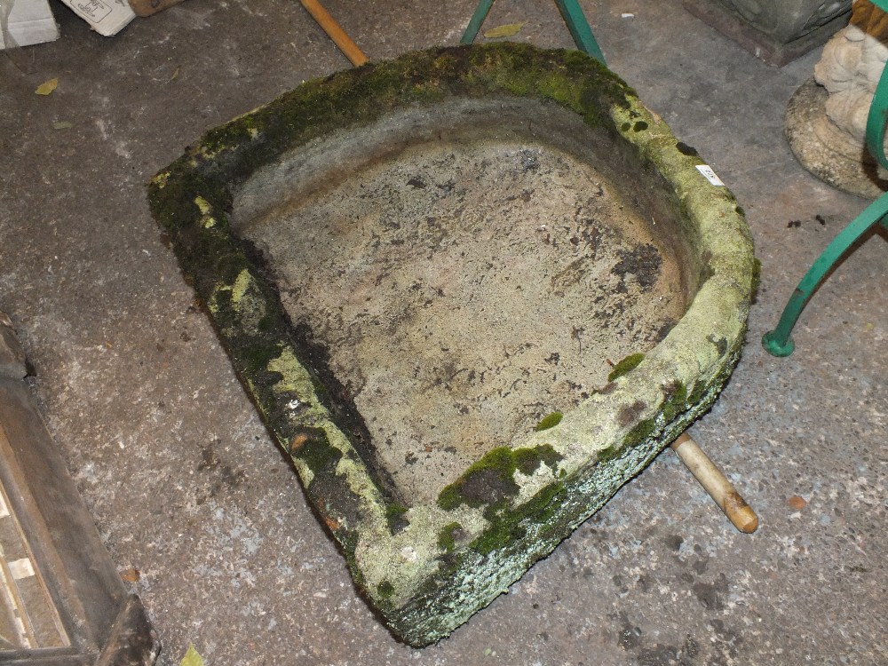 A LARGE STONE TROUGH