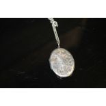 A LARGE HALLMARKED SILVER LOCKET ON CHAIN