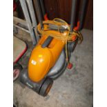 AN ELECTRIC FLYMO LAWNMOWER