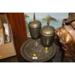 A PAIR OF EASTERN STYLE BRASS URNS TOGETHER WITH A SMALL CHARGER