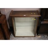 A SMALL GLAZED DISPLAY CABINET W 70 CM