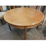 A TEAK DINING TABLE