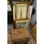 A LARGE QUANTITY OF ASSORTED PICTURES AND PRINTS CONTAINED IN A SUITCASE, BASKET AND LOOSE