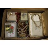 A BOX OF ASSORTED COSTUME JEWELLERY