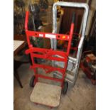 A BOTTLE TROLLEY AND STEP LADDERS