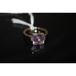 A HALLMARKED 9K GOLD AMETHYST AND DIAMOND RING, the amethyst measuring approx 10 mm x 10 mm ring