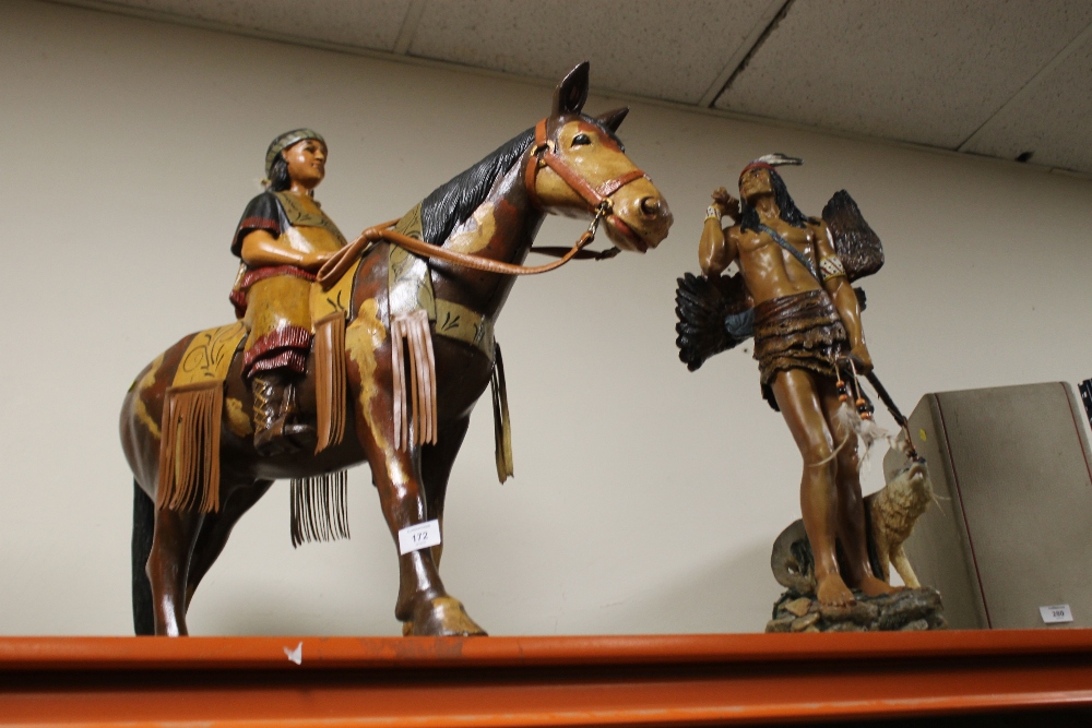 LARGE RESIN FIGURE OF A RED INDIAN ON HORSEBACK TOGETHER WITH RED INDIAN HUNTSMAN FIGURE