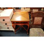 AN ANTIQUE OAK HANDKERCHIEF GAMES TABLE - MINUS FRIEZE DRAWER