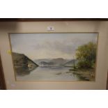 FRAMED AND GLAZED WATERCOLOUR SIGNED GV GADD DEPICTING A LAKE SCENE WITH BOATS ( INFORMATION TO