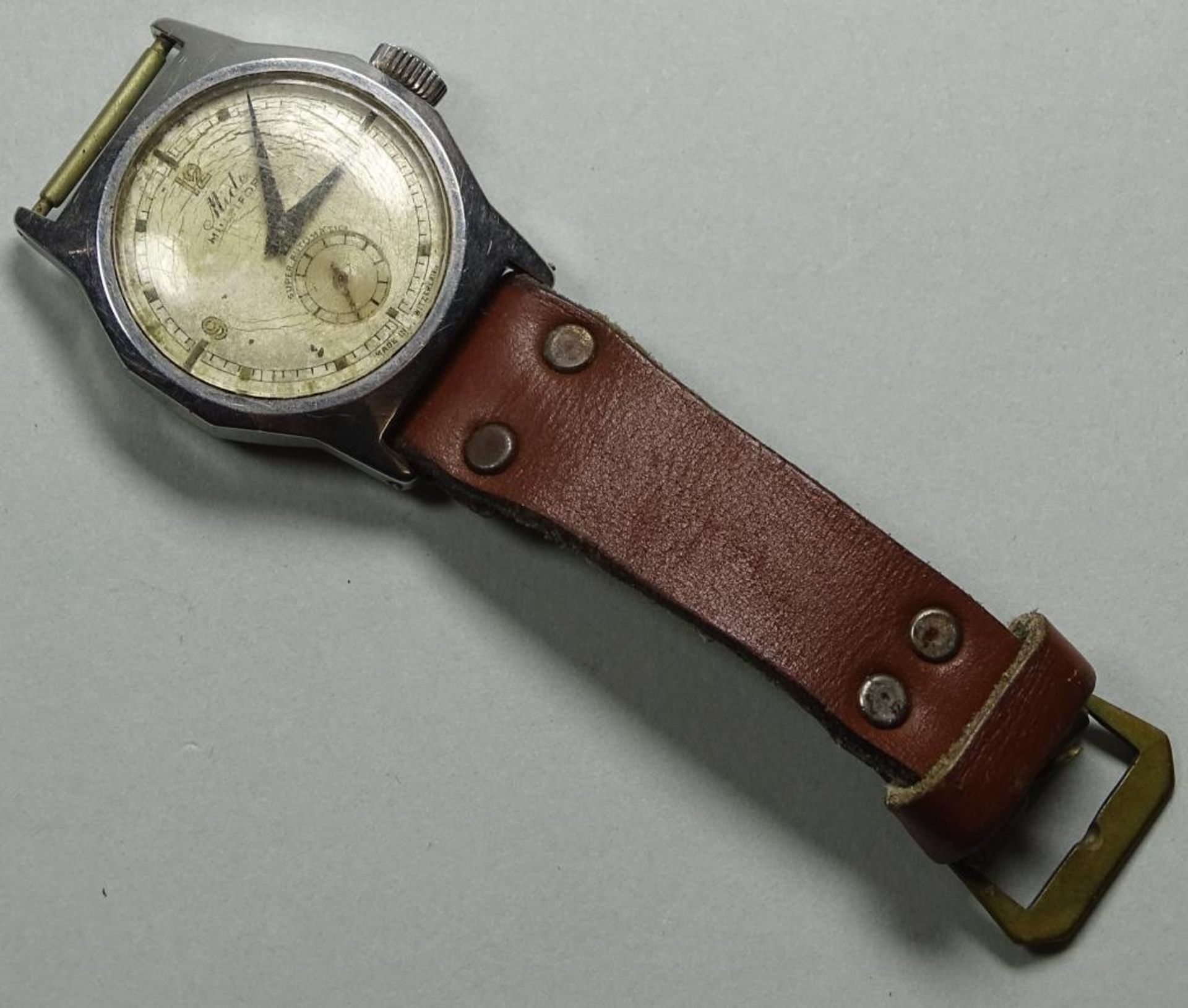 Vintage Armbanduhr "Mido-Multifort",Handaufzug,Werk läuft,ein Band,Tragespuren,d-28m