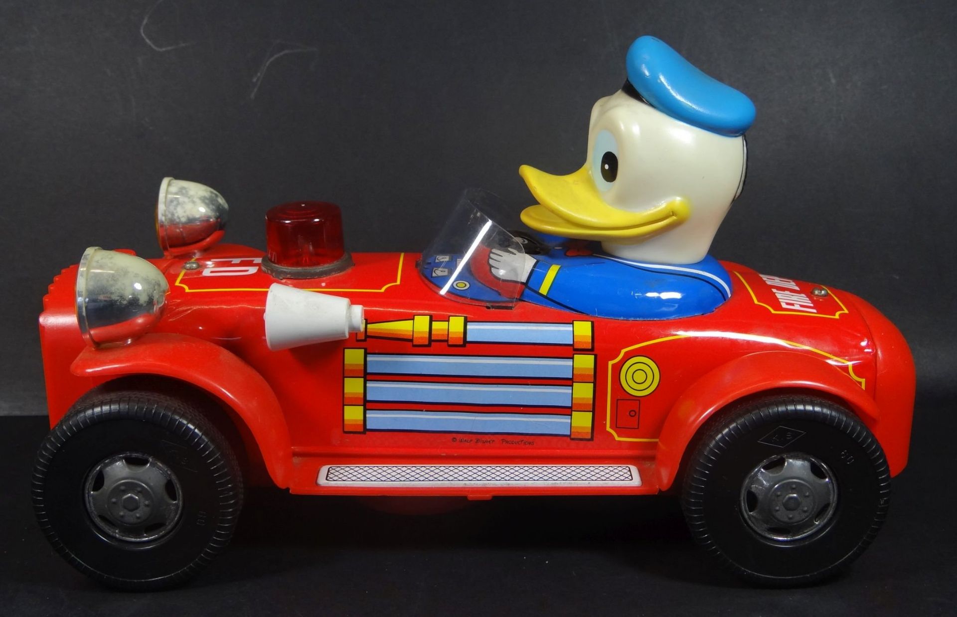 Feuerwehrauto mit Donald Duck "Modern Toys" Japan, optisch sehr gut erhalten, Batteriebtrieb nicht