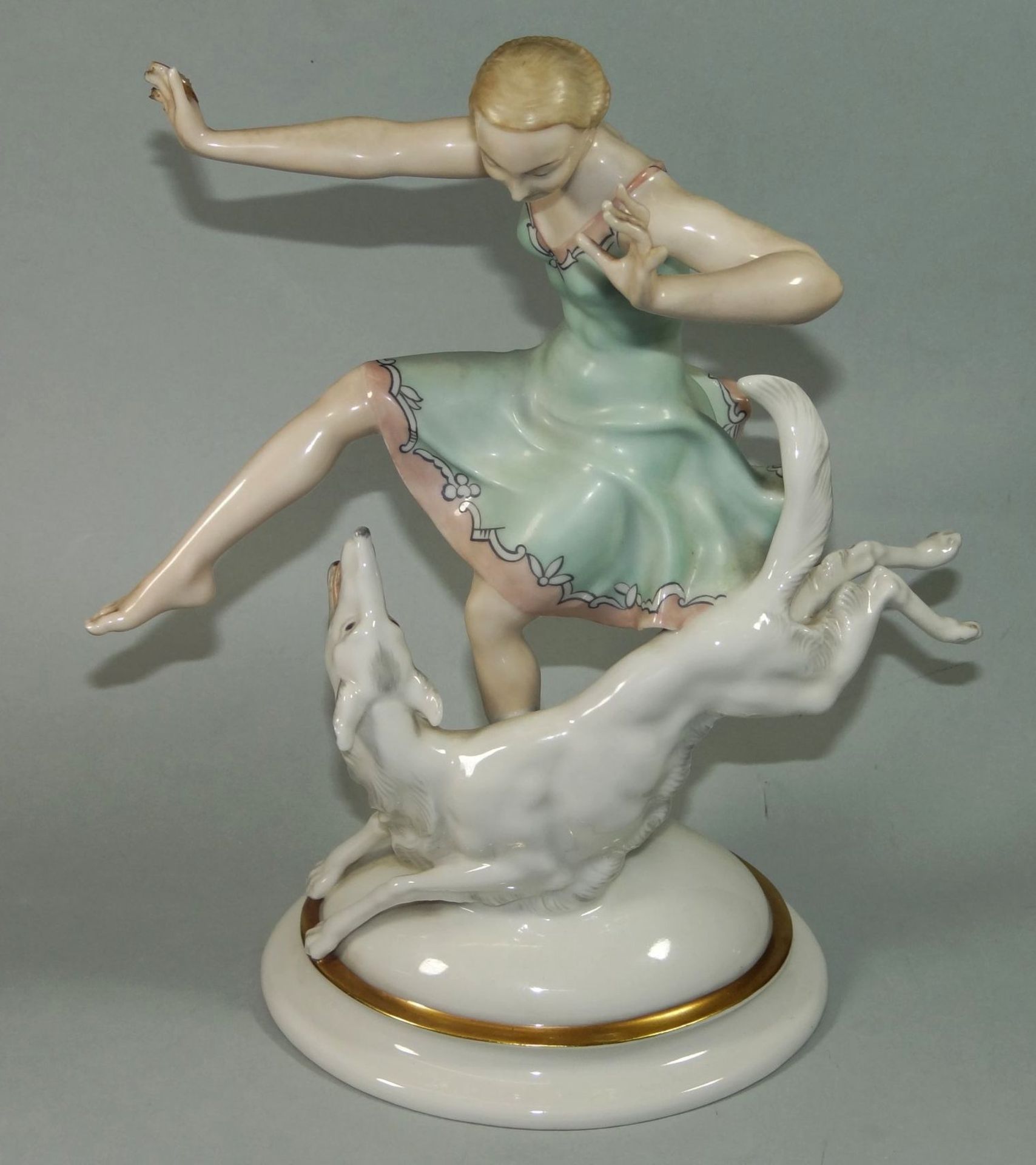 gr. Figur "Hutschenreuther" Mädchen mit Windhund, signiert C. Werner, Finger beschädigt,