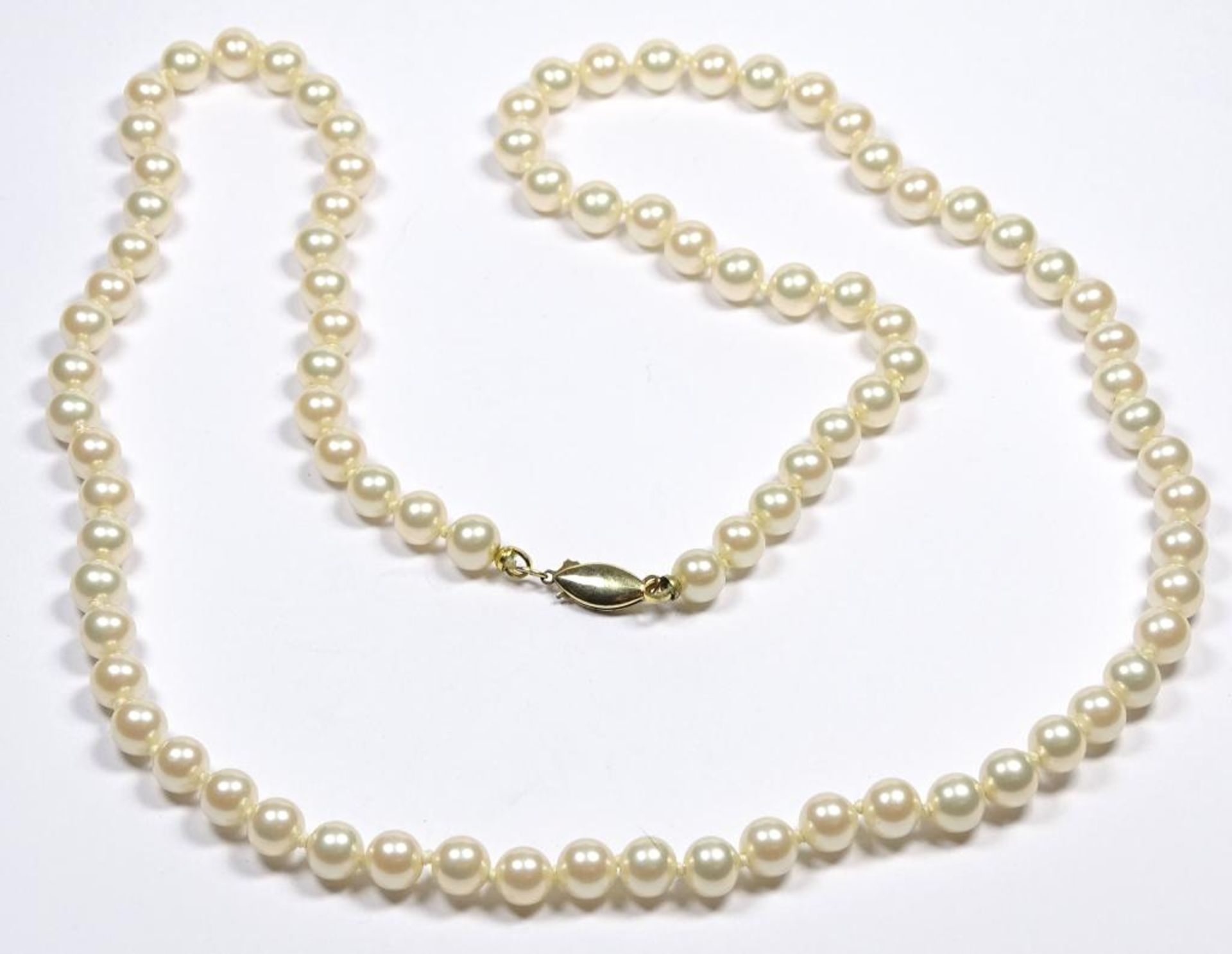 Akoya Perlen Halskette mit einer 585er GG Schließe,ca.L- 62cm,d-6,4-6,5m