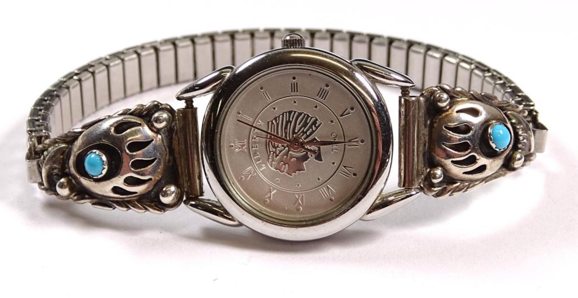 Damen Armbanduhr "Tino",Quartz,seitlich Silber mit türkisen , Band Edelstahl,derzeit läuft die