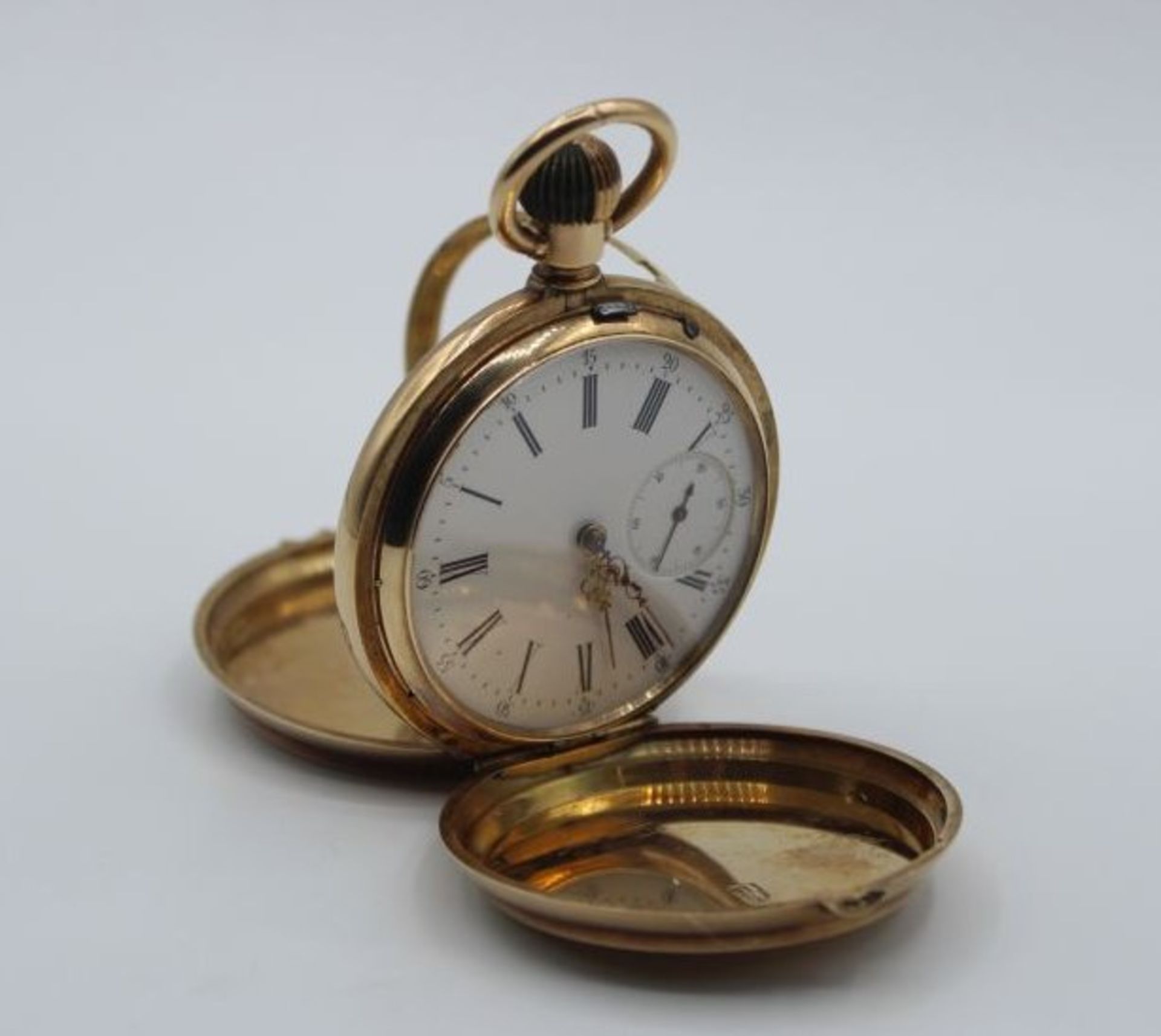 Tascheuhr um 1900, 14 Karat Gold, 2seitig beschaubar, Uhrzeit verso Kalendarium, Glas bei