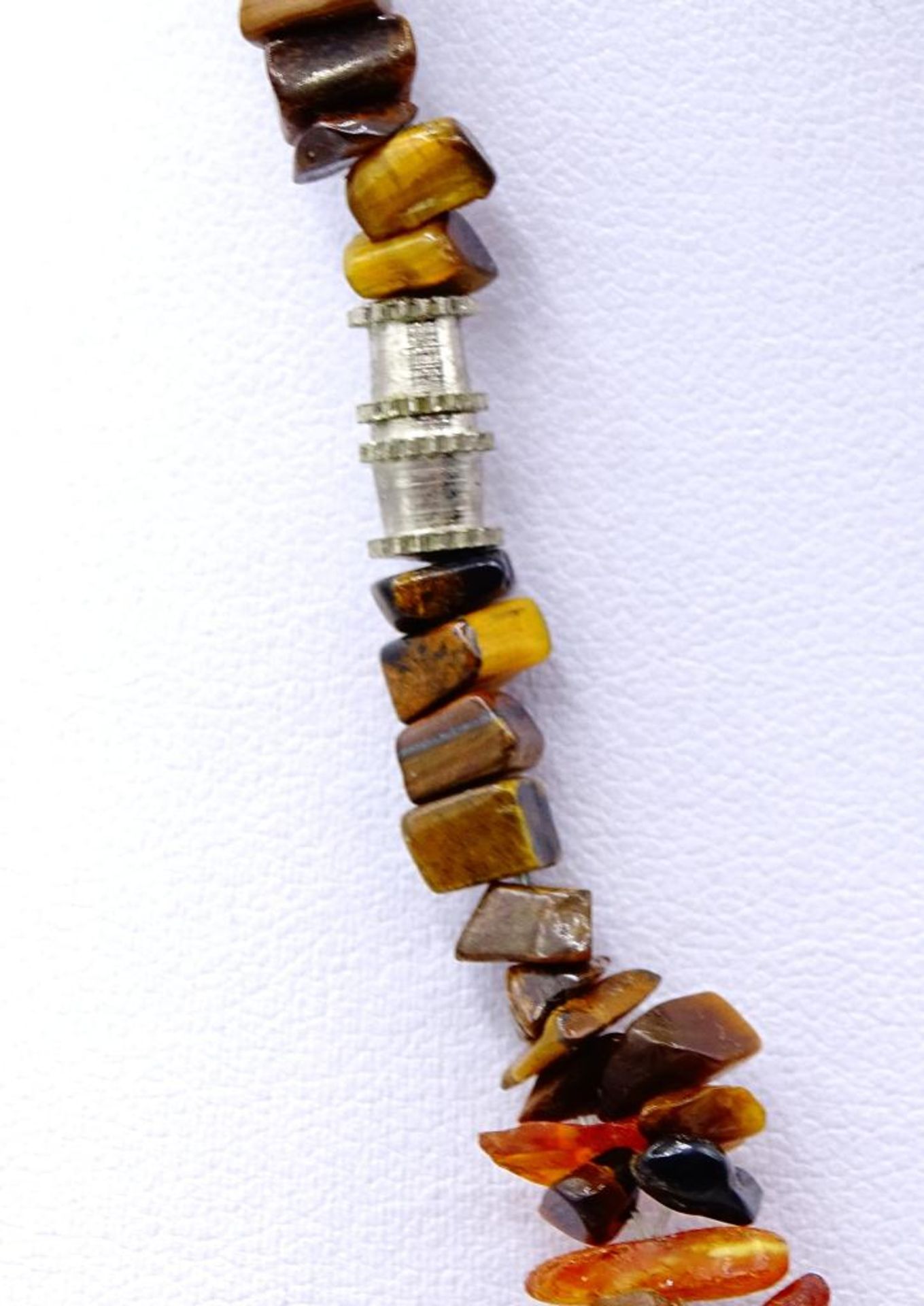 Tigerauge-Bernstein-Halskette mit einen versilberten Dreh-Verschluss,ca.L- 54cm, 70gr. - Bild 4 aus 4