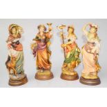 4 Jahreszeitenfiguren aus Oberammergau Linde geschnitzt polychrom gefasst, 4 Schönheiten auf