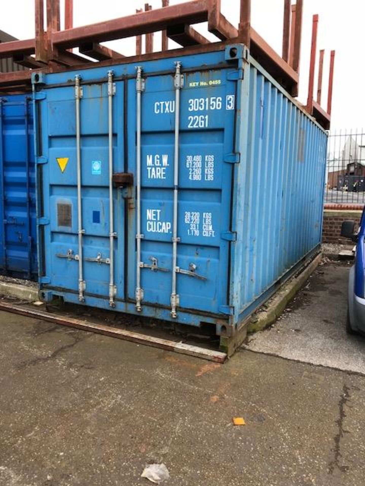20' steel shipping container complete with the four steel four drawer filing cabinets & four steel