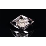 An 18ct white gold and diamond ring set with an emerald cut diamond of approximately 0.80 carats,