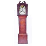 A 19th century oak cased longcase clock with 30 hour movement the painted dial with black Roman