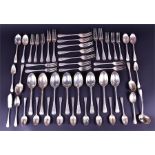 A part-service of George V silver flatware (an eight-place setting with extras) London 1918, by
