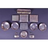 Four silver cigarette cases, early 20th century various dates and makers, together with four