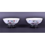 A Pair of Republic period Chinese porcelain famille rose bowls the white grounds decorated with