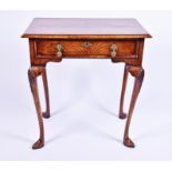 A 19th century walnut single-drawer side table on four cabriole legs with hoof feet, 67cm wide x