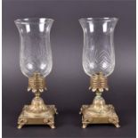 A good pair of Regency cast bronze candlesticks  the Greek Key collars supported on foliate stems