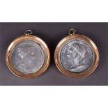 A pair of 19th century cast metal Napoleon and Josephine roundels, each signed Andreiu .F. each with